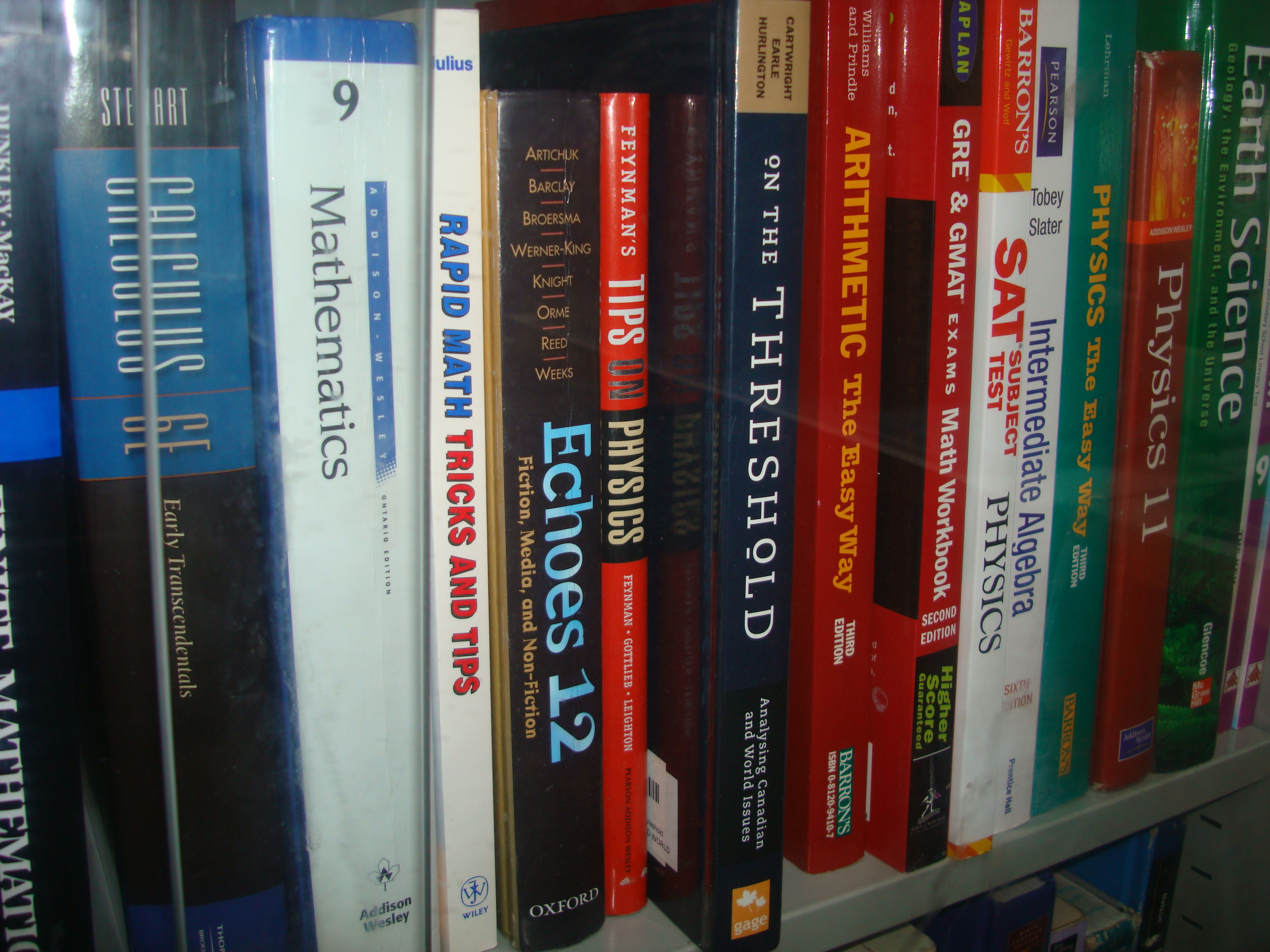 Educational books on a shelf